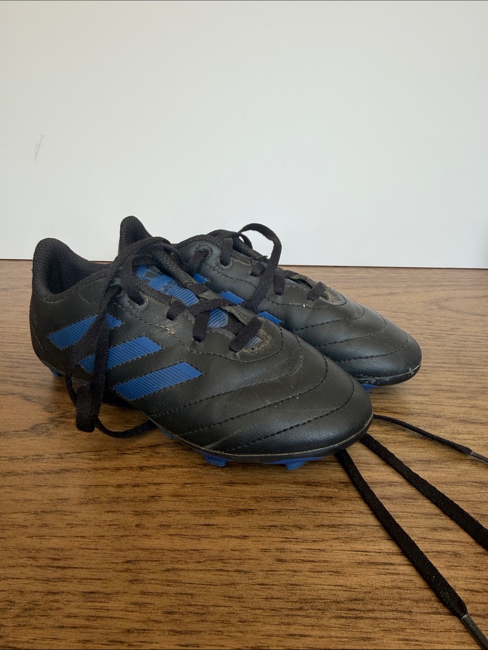 adidas Kids Black and Blue Soccer Cleats with Three Stripes